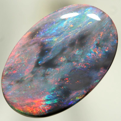 SOLID BLACK OPAL Red shades contrasts with turquoise sea colours. SEE VIDEO